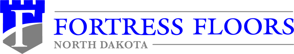 A logo featuring the text "Fortress Floors North Dakota" with a stylized blue and gray castle tower design to the left.