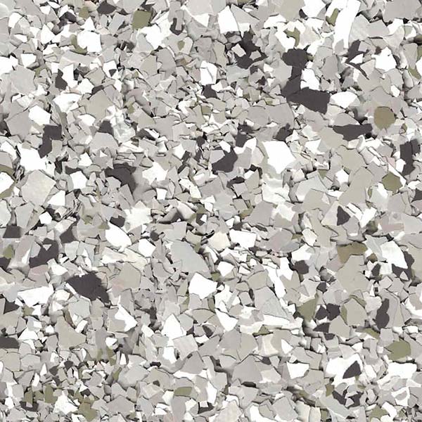 The image shows a surface with irregular gray and white fragments, creating a textured pattern resembling stone or concrete chips.